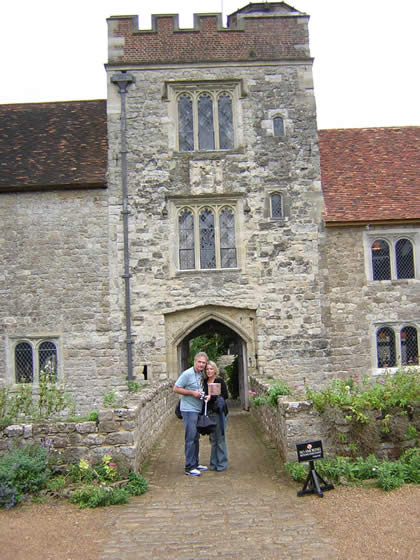 Dad and Mom at the courtyard entrance to Ightham Mote