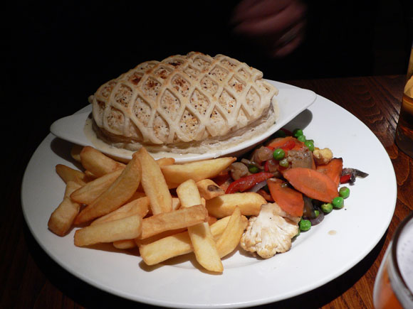 An enormous pastry-topped chicken and leek pie at the Prince of Wales pub in East Molesey.